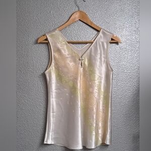 Patal Cream Sleeveless Blouse With Embossed Design